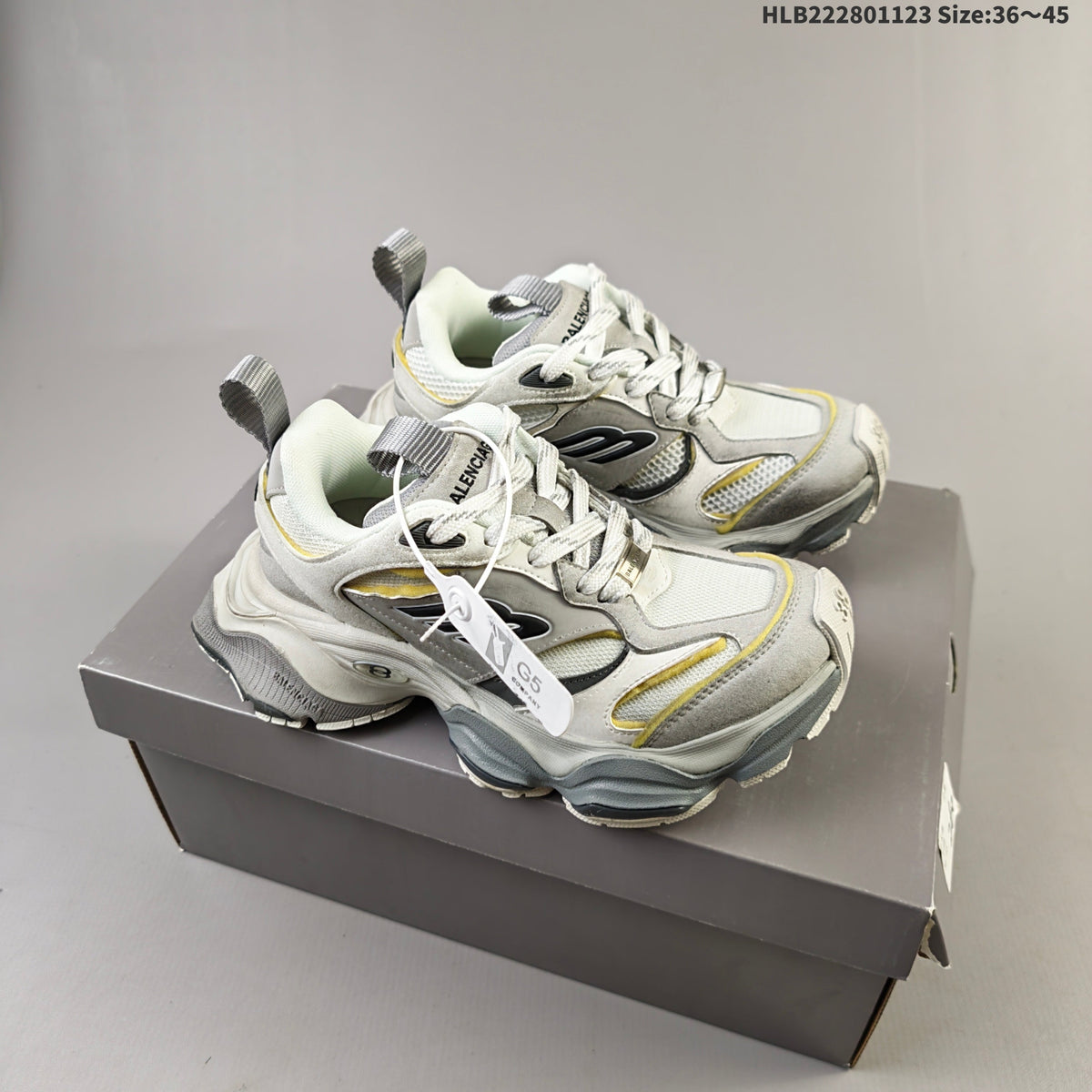 Balenciaga Monday Low-Top Sneakers in White, in Gray and Yellow - product image from the listing.