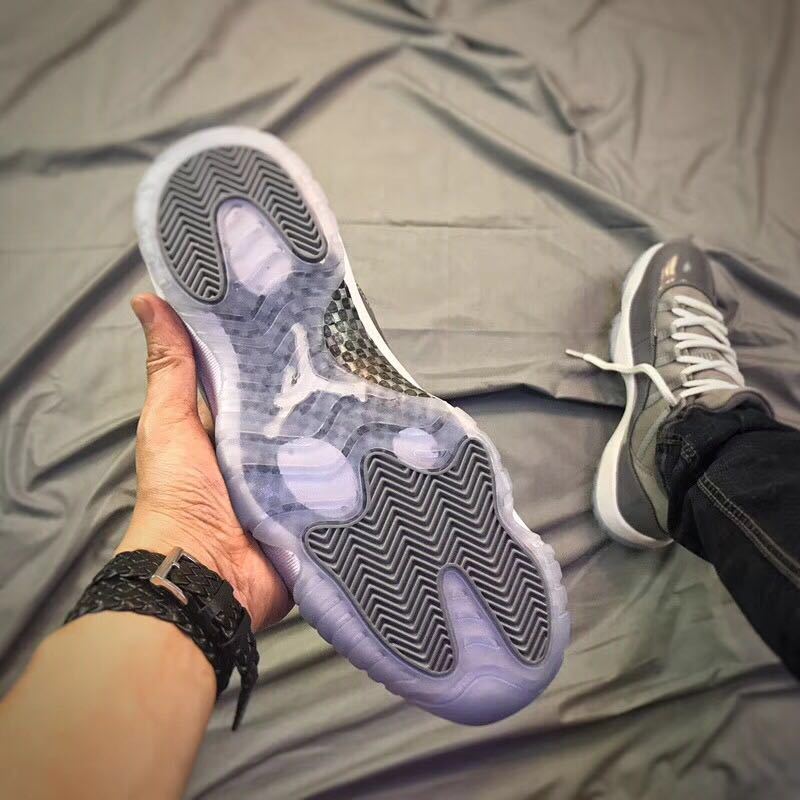Air Jordan 11 Low Sneakers in Cool Grey - product image from the listing.