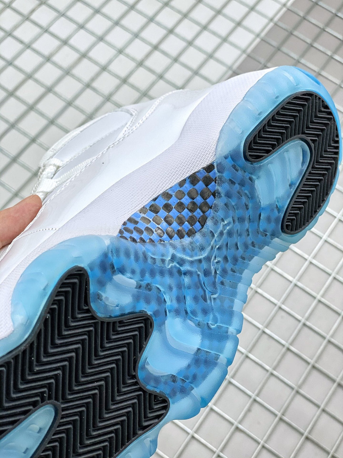 Jordan 11 Legend Blue Sneakers in White Blue 378037-117 - product image from the listing.