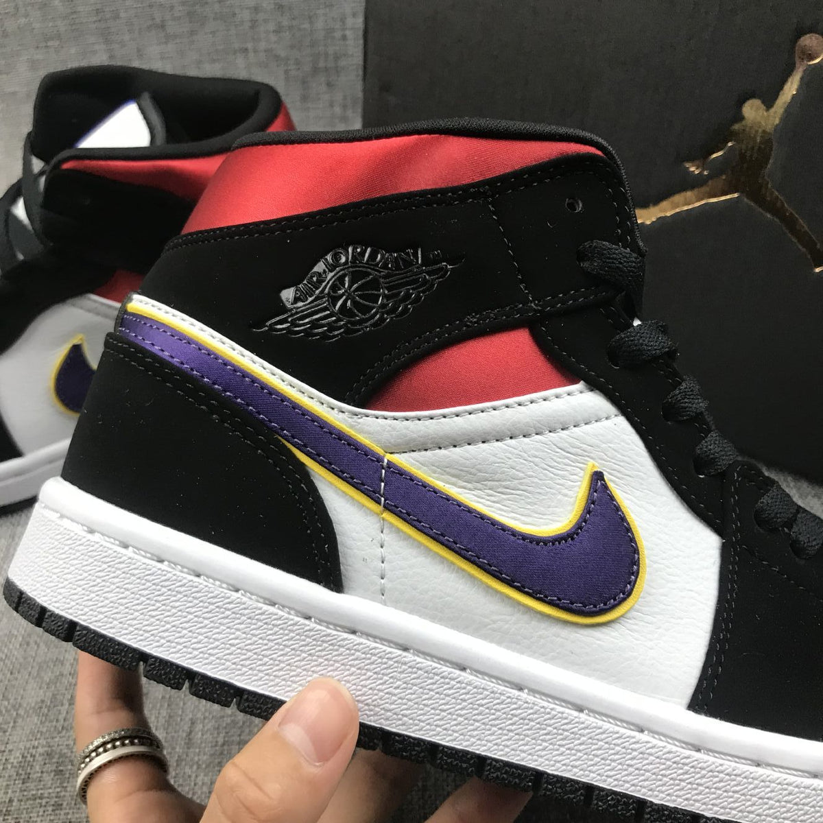 Air Jordan 1 Mid SE Sneakers in Black Purple Yellow 852542-005 - product image from the listing.