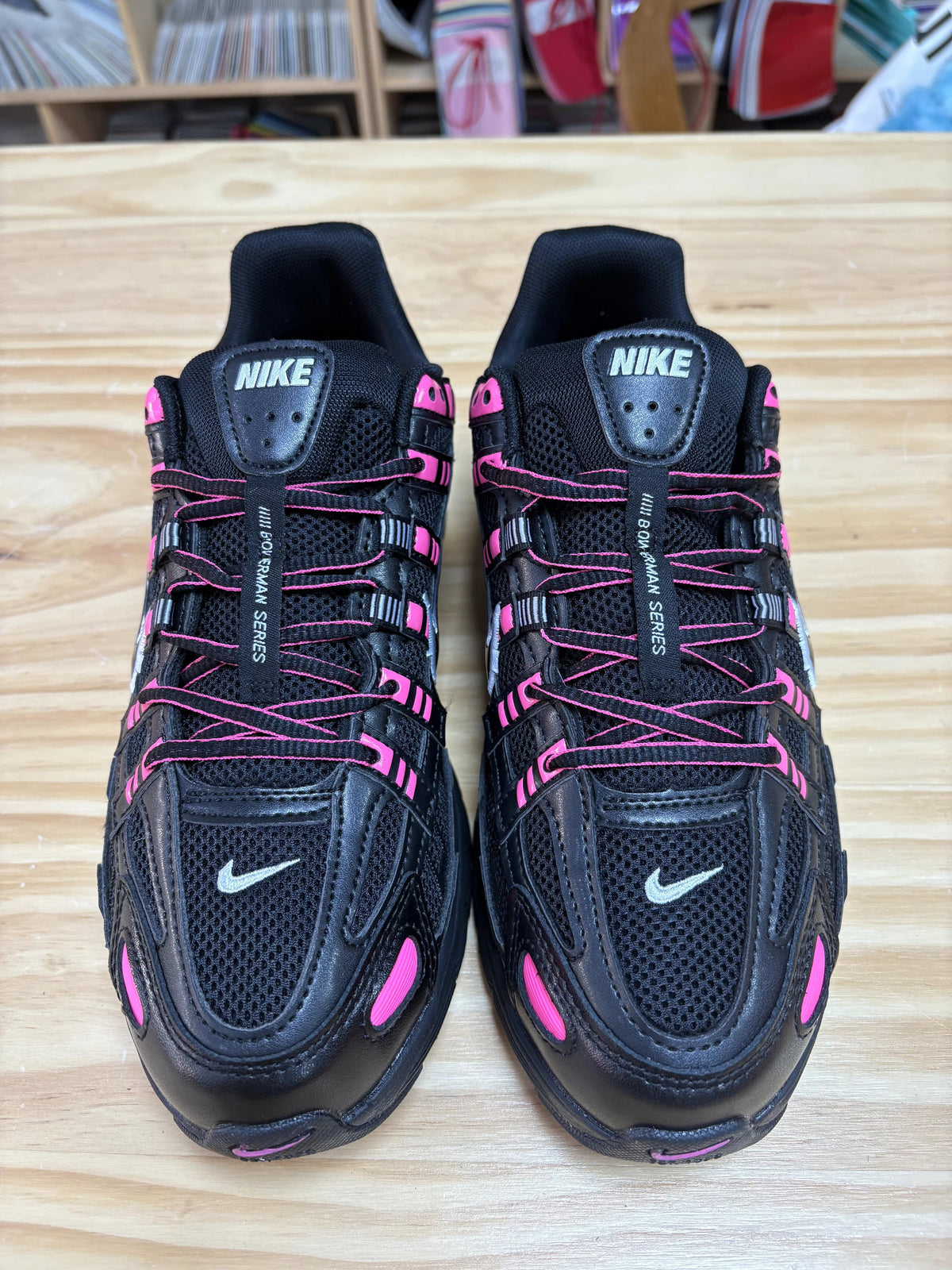 Nike P-6000 Sneakers in Black and Pink CD6404-600 - product image from the listing.