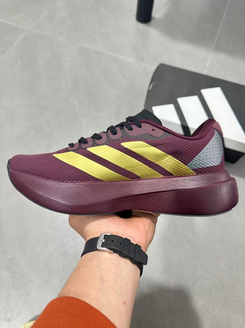 Adidas Lightstrike Pro Running Shoes in Burgundy Gold JQ4443 - product image from the listing.