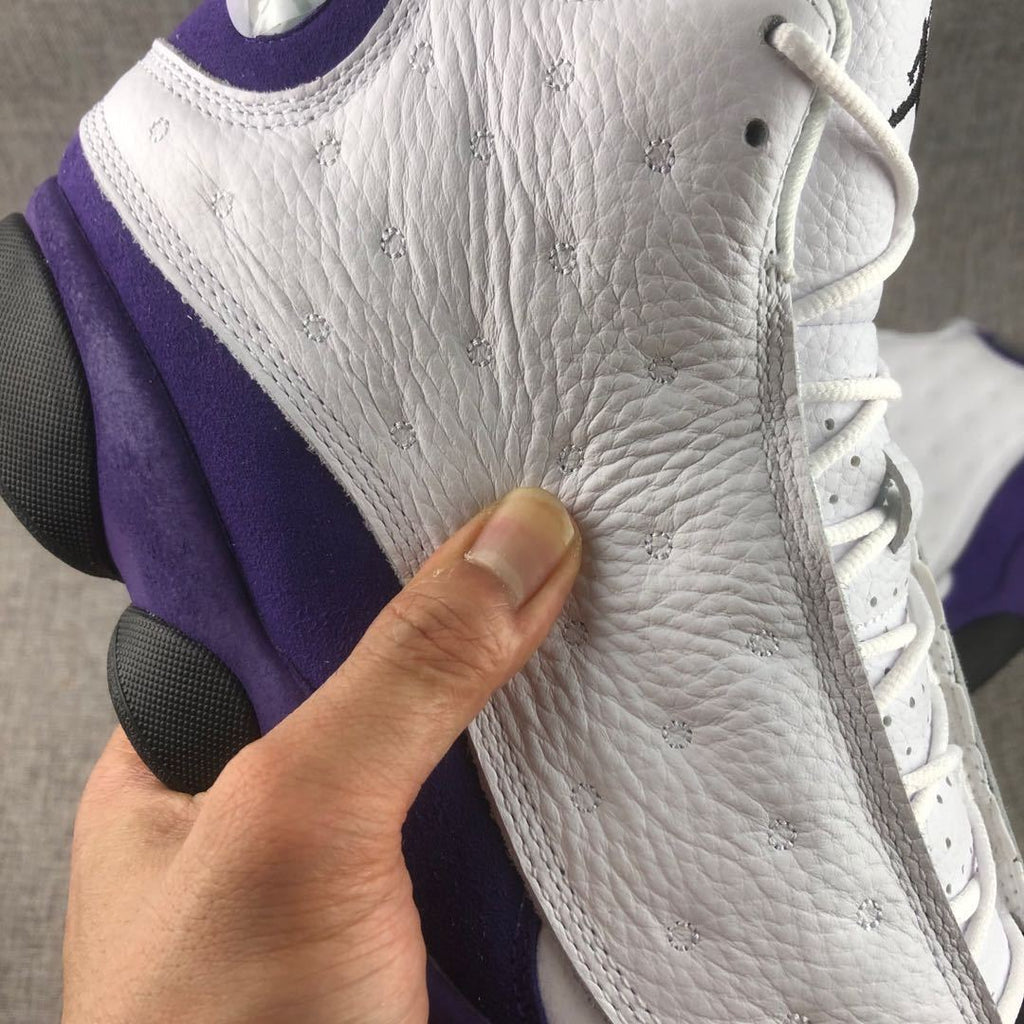 Air Jordan 13 Lakers Sneakers White Purple 414571-105 - product image from the listing.