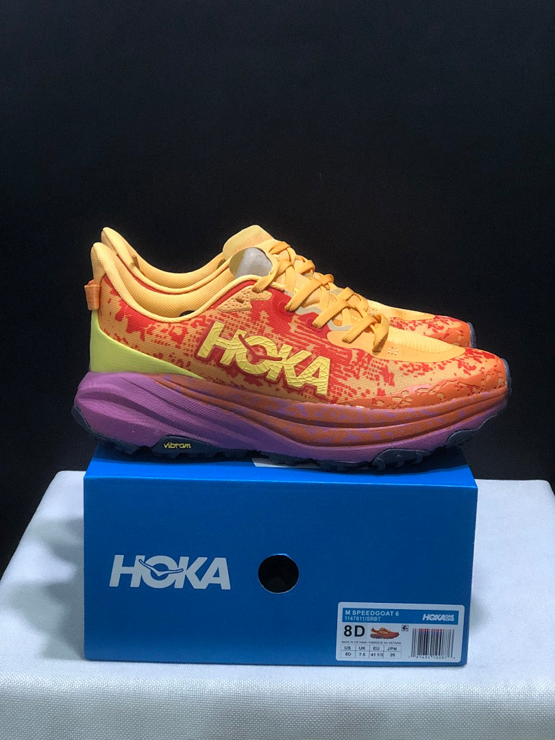 HOKA Speedgoat 6 Trail Running Shoes, in Orange and Yellow - product image from the listing.