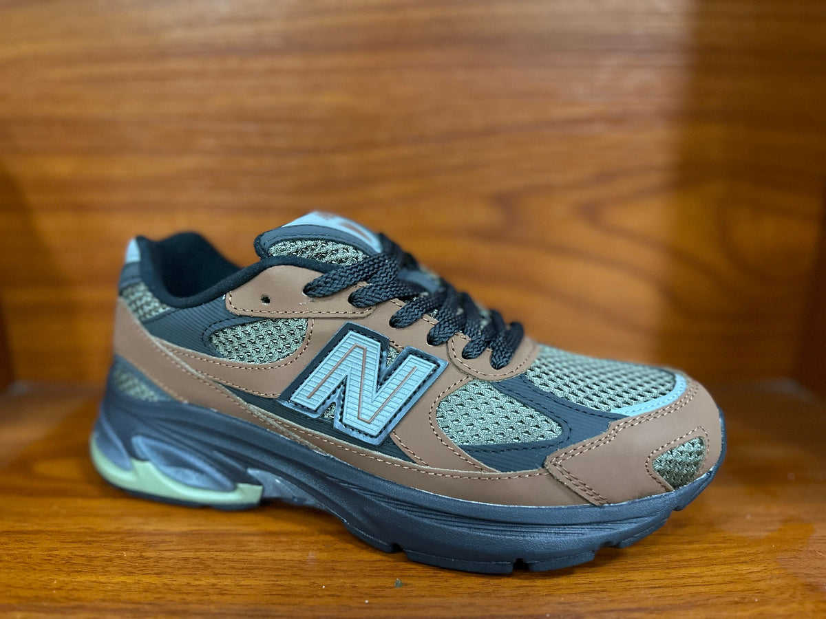 Taupe and Blue New Balance 9060 Sneakers - product image from the listing.