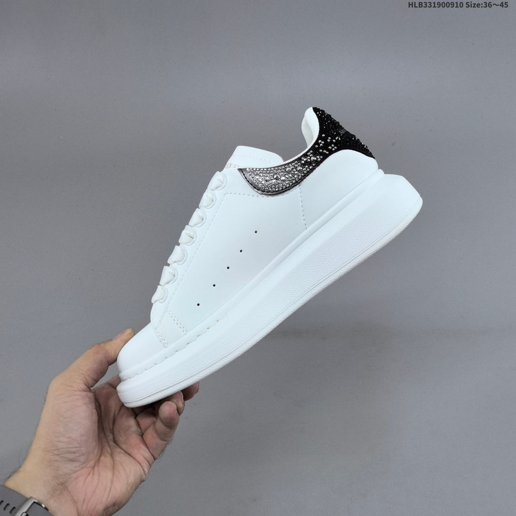 Alexander McQueen Oversized Low-Cut Sneakers with Crystal Heel - product image from the listing.