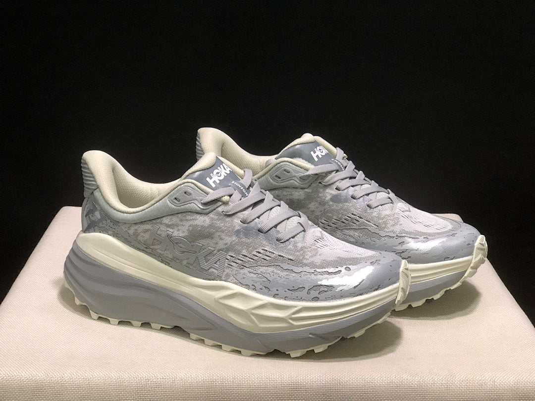 HOKA Stinson 7 Trail Running Shoes, in Gray - product image from the listing.