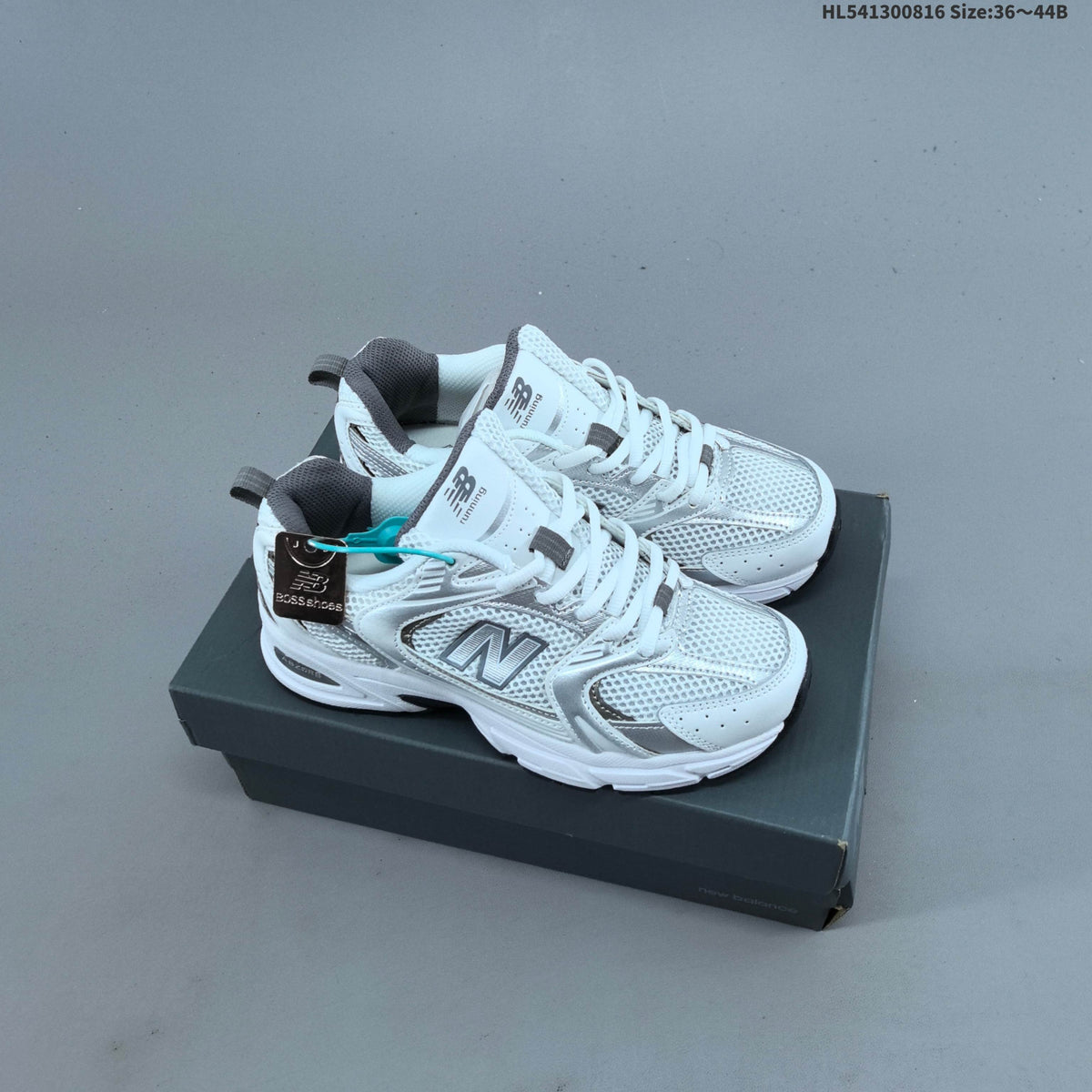 White and Silver New Balance 530-Style Mesh Sneakers - product image from the listing.