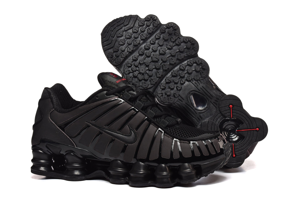 Black and Pink Nike Shox TL Sneakers - product image from the listing.
