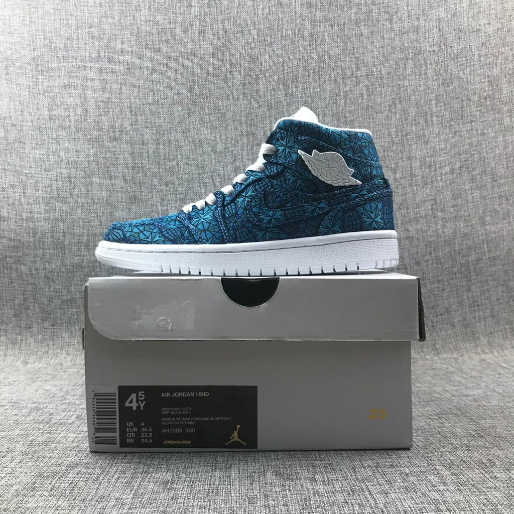 Women's Air Jordan 1 Mid Blue Pattern Sneakers AH7389-300 - product image from the listing.