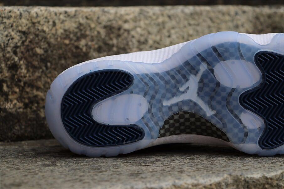 Navy Snakeskin Sneakers - Air Jordan 11 Low - product image from the listing.