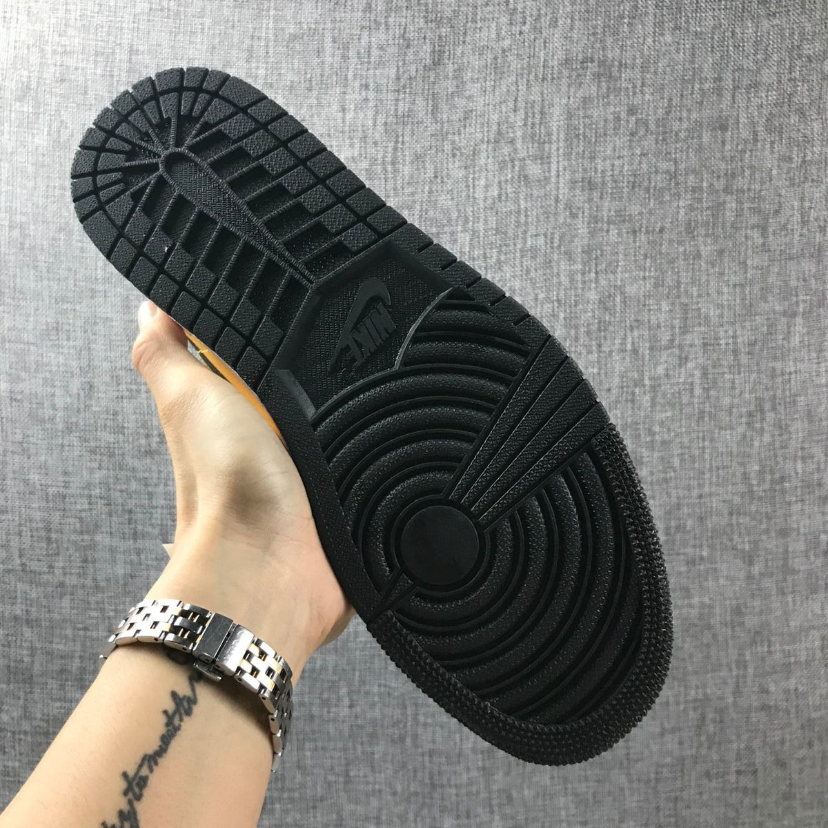 Air Jordan 1 Mid Sneakers in University Gold Black White - product image from the listing.