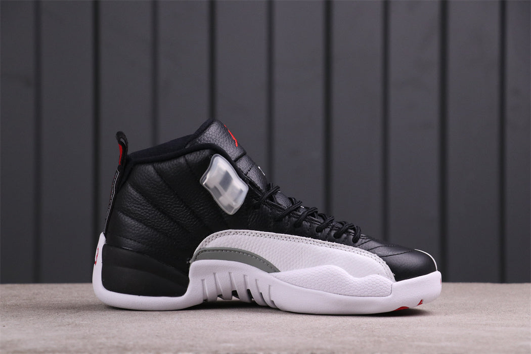 Air Jordan 12 Reverse Taxi Black White 130690-001 - product image from the listing.