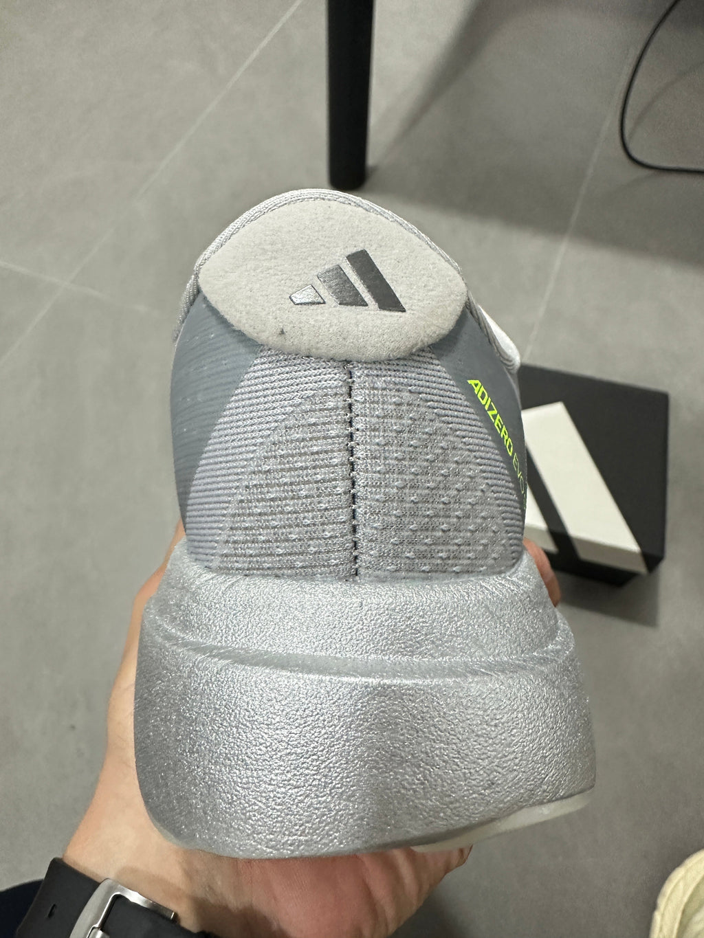adidas Adizero Evo SL Running Shoes in Light Grey - product image from the listing.