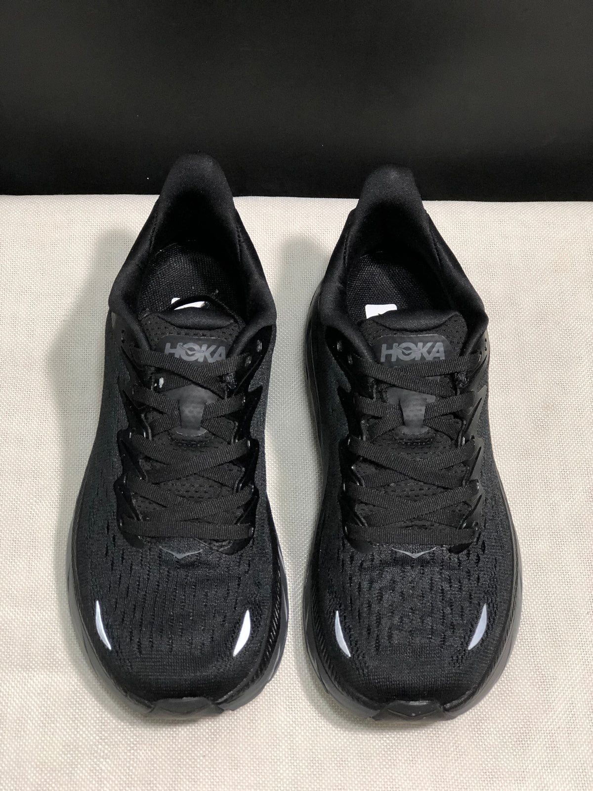 HOKA Clifton 8 Shoes for Running, Black and Ink Wash - product image from the listing.