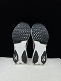 On Cloudboom Strike LS Running Shoes in White Purple - product image from the listing.