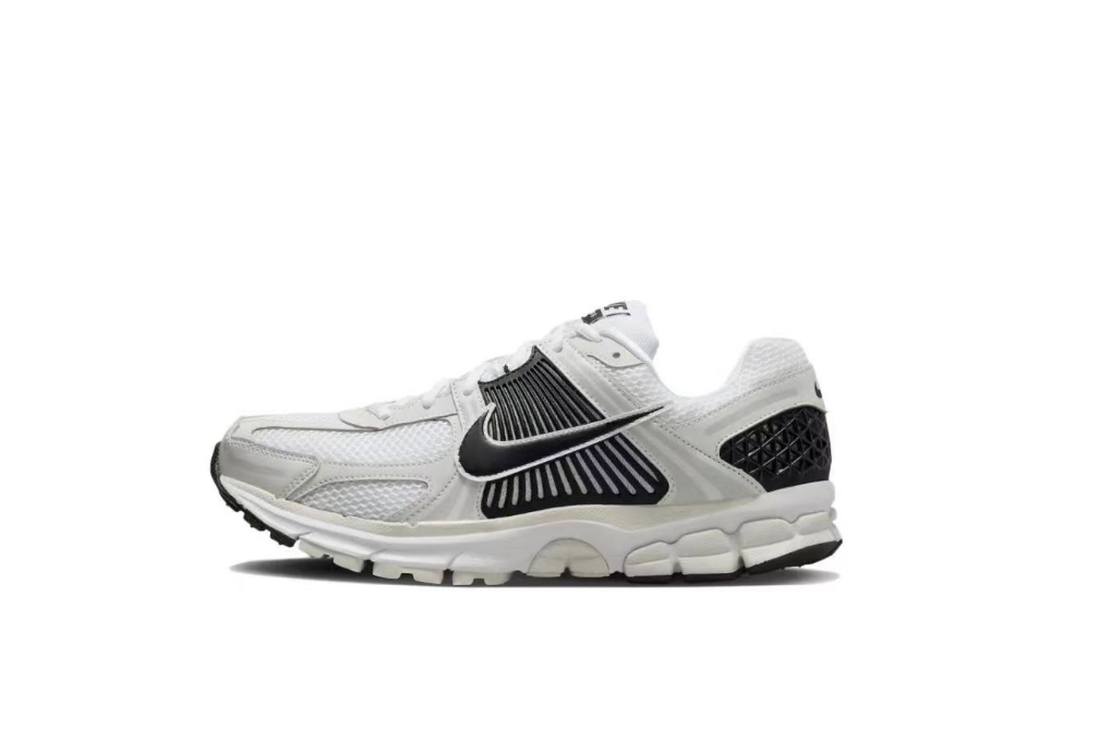 Nike Air Zoom Vomero 5 Running Shoes, in White and Black - product image from the listing.