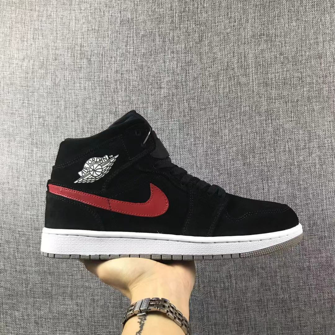 Jordan 1 Mid Sneakers in Black Red Blue 554724-065 - product image from the listing.