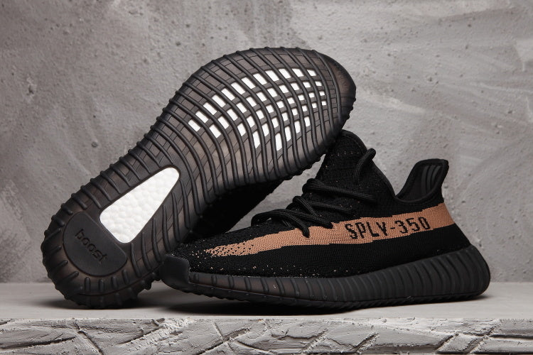 Yeezy Boost 350 V2 Sneakers in Black and Tan - product image from the listing.