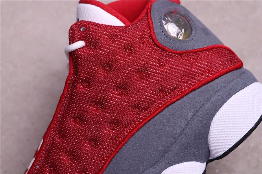 Air Jordan 13 Red Flint Sneakers 414571-600 - product image from the listing.