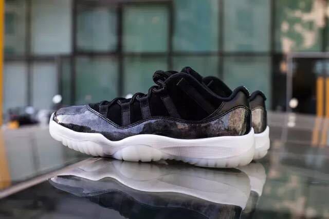 Jordan 11 Retro Low Barons Sneakers in Black White - product image from the listing.