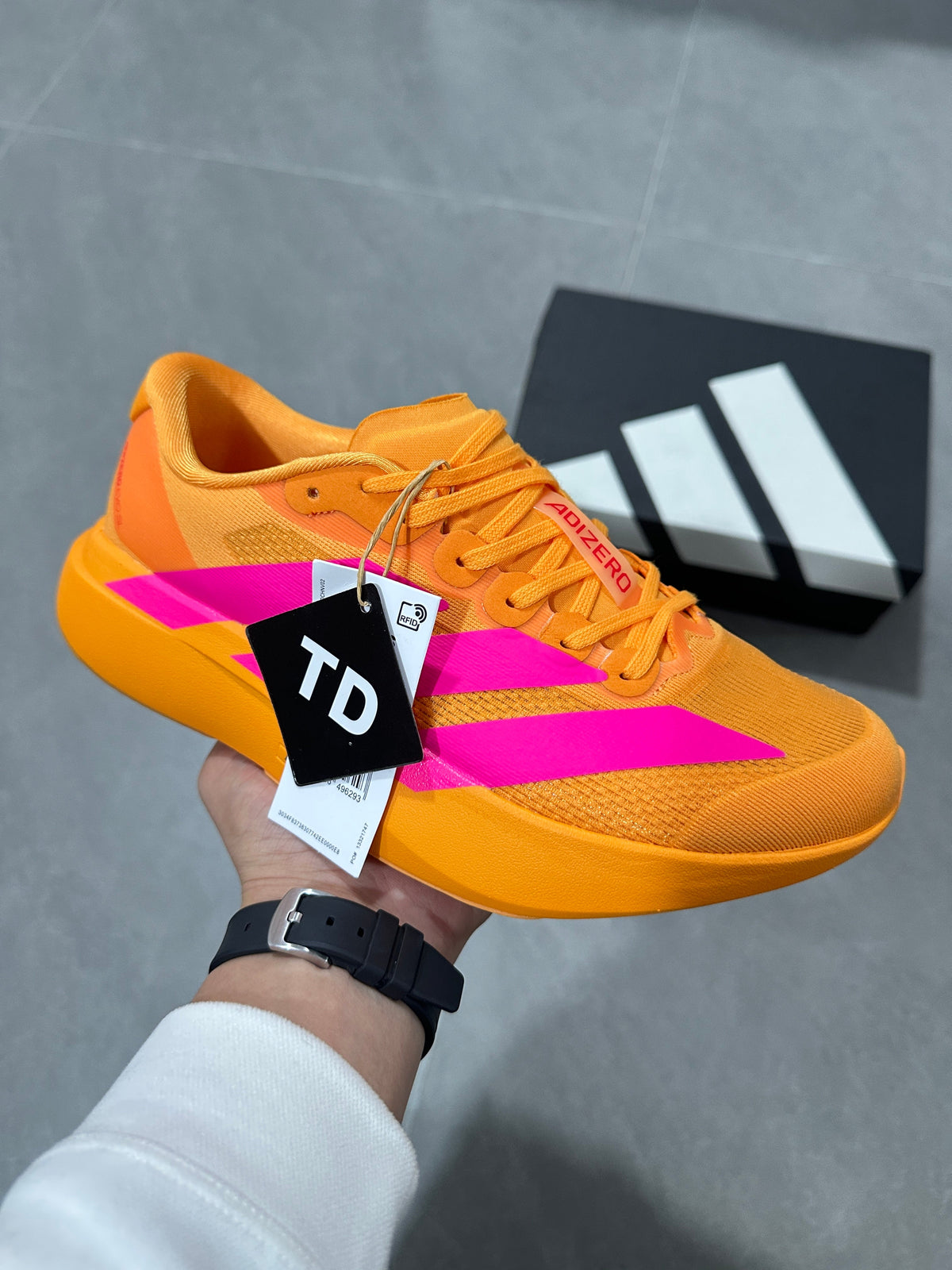 adidas Adizero Lightstrike Pro Running Shoes in Gold Pink - product image from the listing.