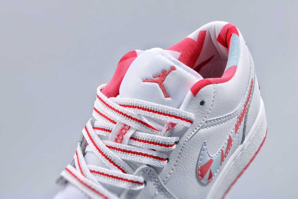 Women's Nike Air Jordan 1 Low White and Pink Sneakers - product image from the listing.