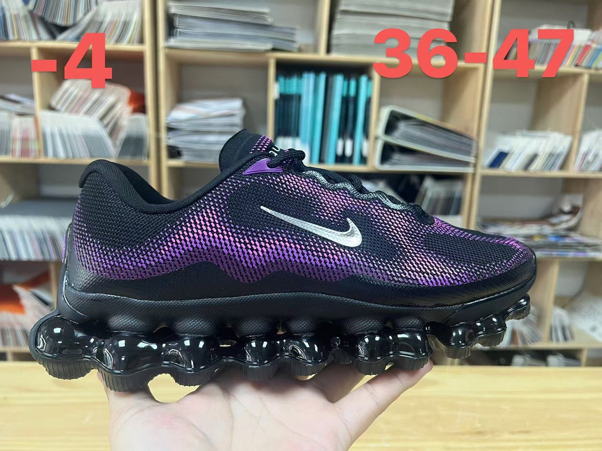 Nike Air Liquid Max Running Shoes, in Black and Purple - product image from the listing.