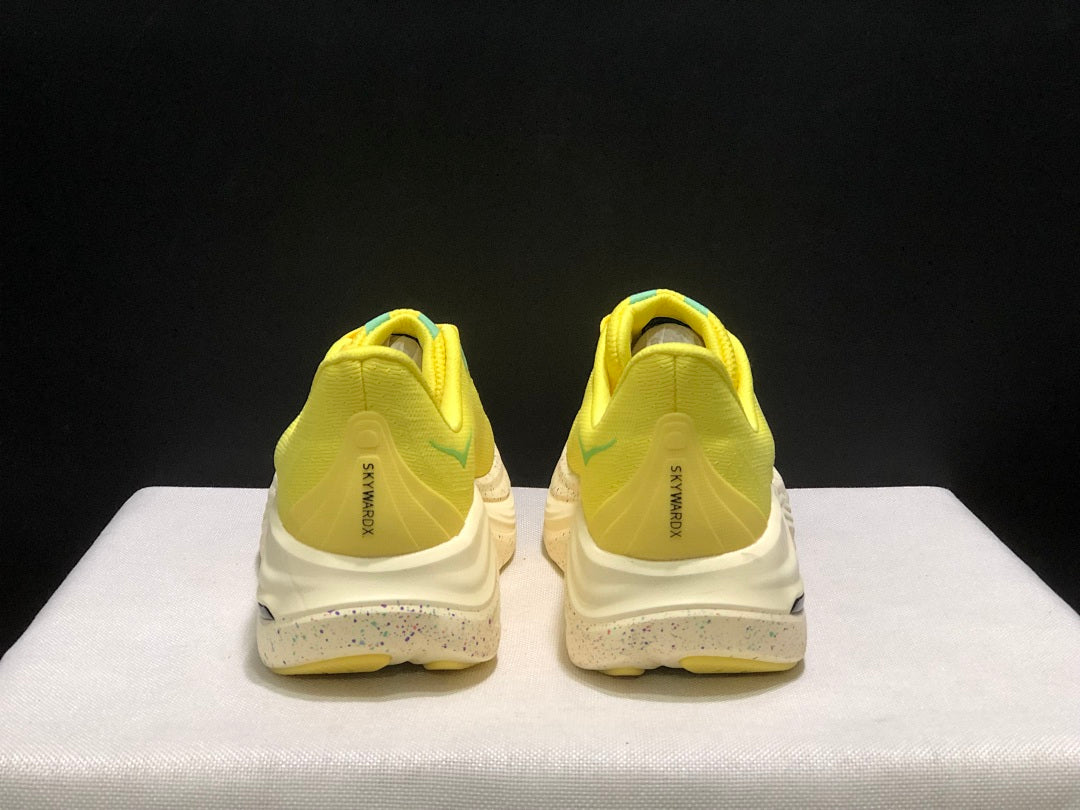 Yellow and Aqua HOKA Skyward X Running Shoes - product image from the listing.