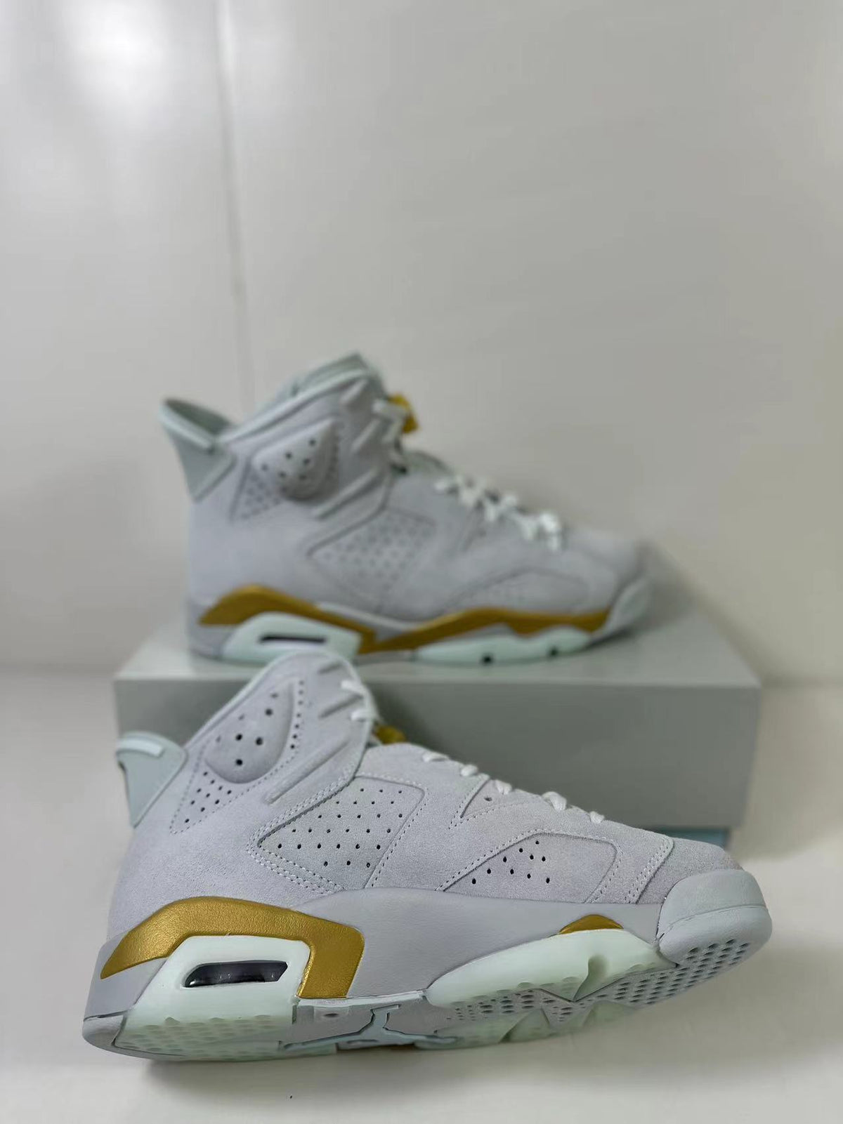 Air Jordan 6 High Sneakers White Gold Glacier Blue DQ4914-074 - product image from the listing.