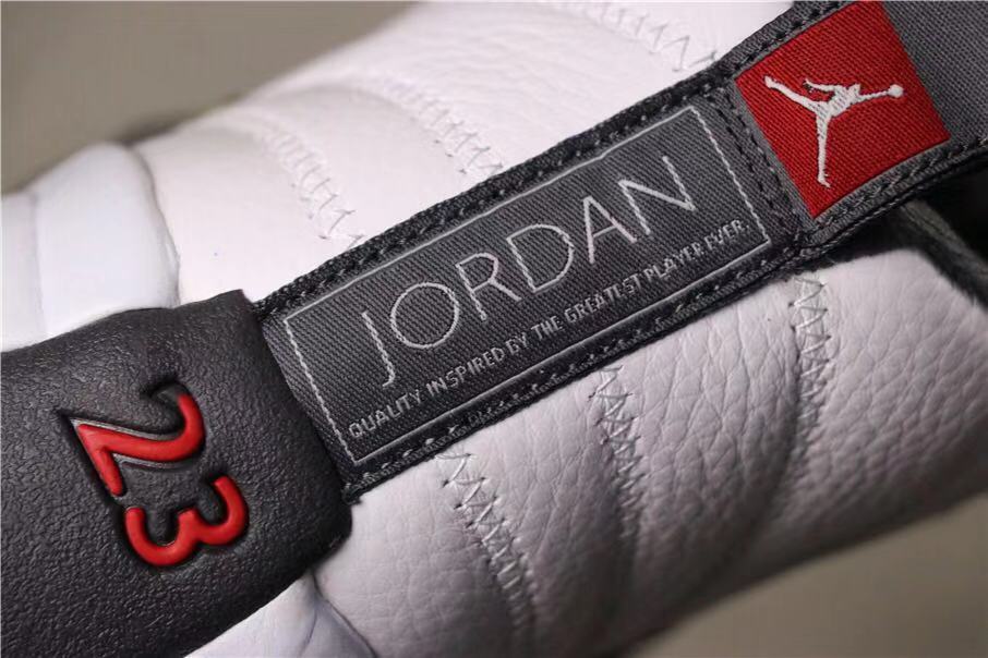 Air Jordan 12 Retro Dark Grey Sneakers in White Black - product image from the listing.
