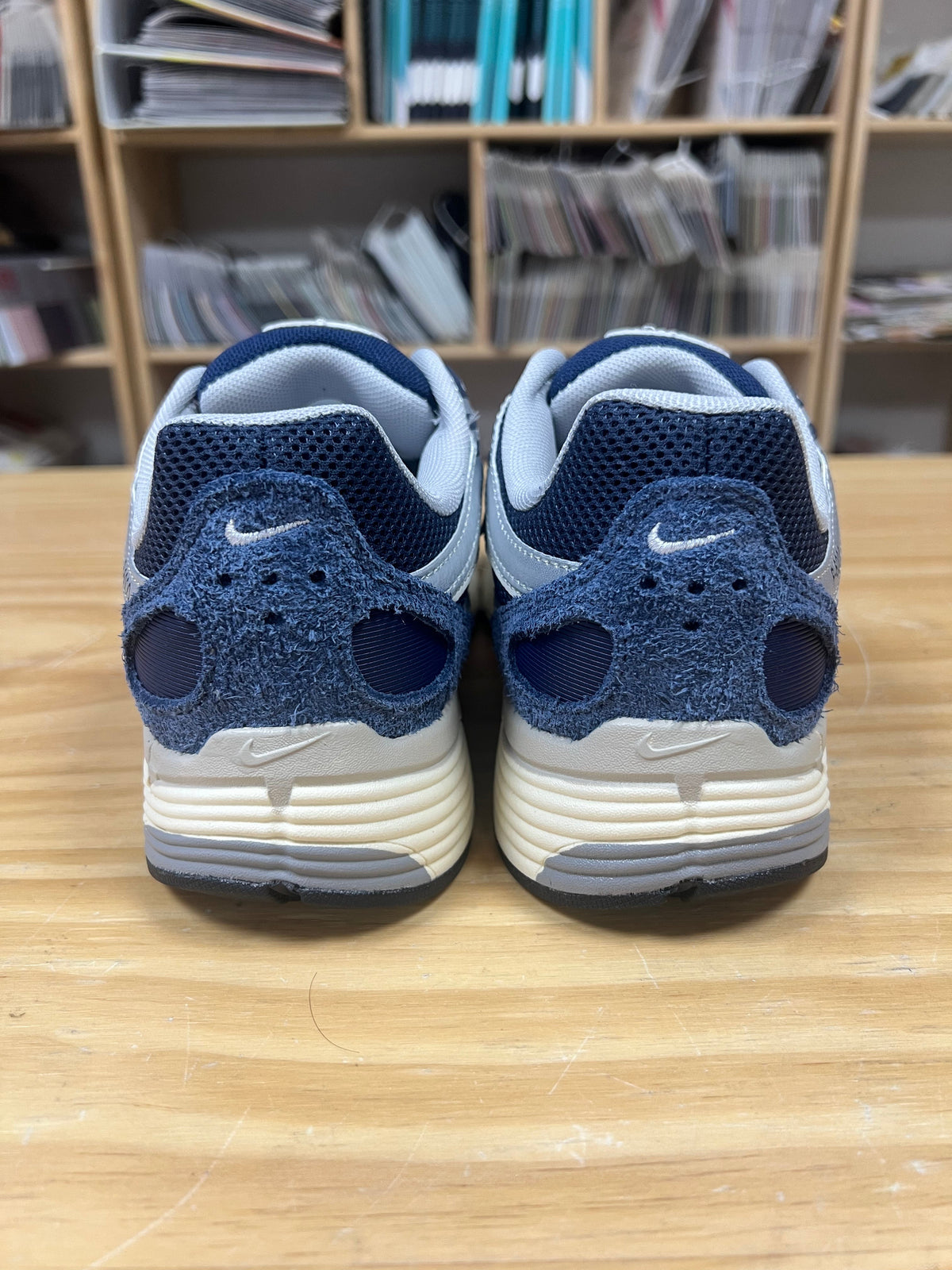 Nike P-6000 Sneakers in Navy and Light Gray IU7549-400 - product image from the listing.