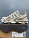 Nike Zoom Vomero 5 Sneakers in Beige White Brown 1203B144-100 - product image from the listing.