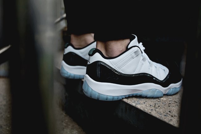 White and Black Air Jordan 11 Iridescent Sneakers - product image from the listing.