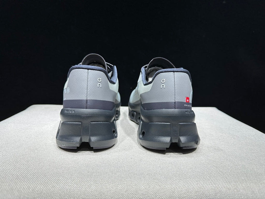 On Cloudmonster Shoes for Running in Eclipse and Magnet - product image from the listing.