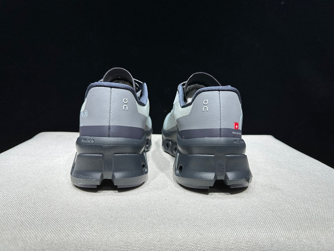 On Cloudmonster Shoes for Running in Eclipse and Magnet - product image from the listing.