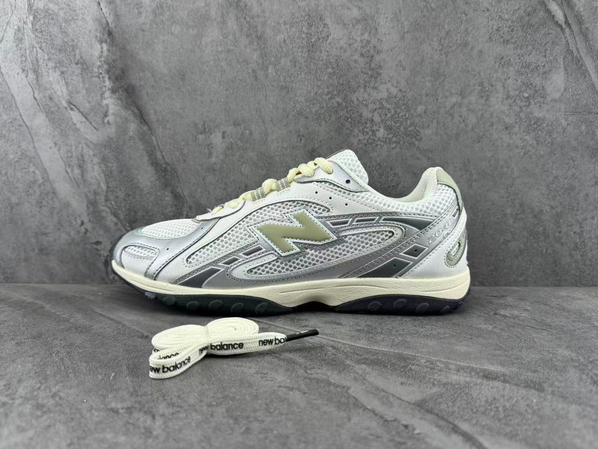 New Balance 2002R Sneakers in Silver and White - product image from the listing.