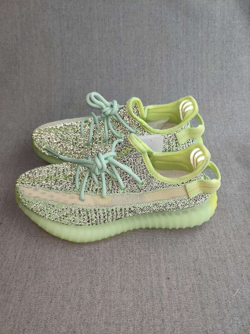 Lime Green and Mint Yeezy 350 V2 Knit Sneakers - product image from the listing.