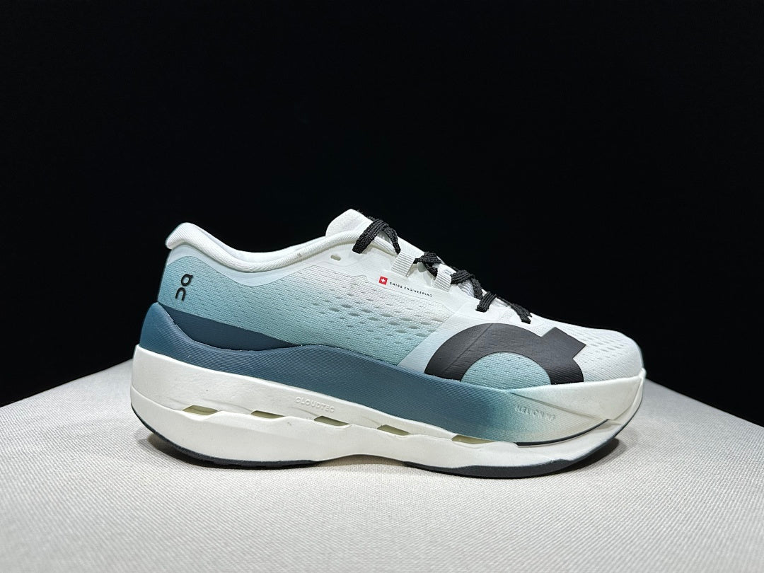 On Cloudboom Max Running Shoes in White and Lake in Blue - product image from the listing.