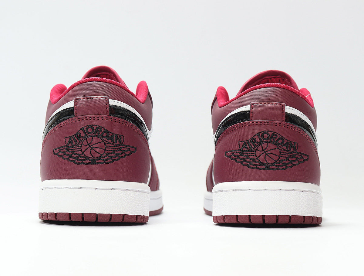 Air Jordan 1 Low Sneakers in Red and White 553558-604 - product image from the listing.