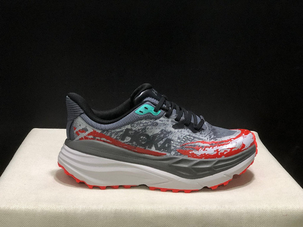 HOKA Stinson 7 Trail Running Shoes in Gray Red - product image from the listing.
