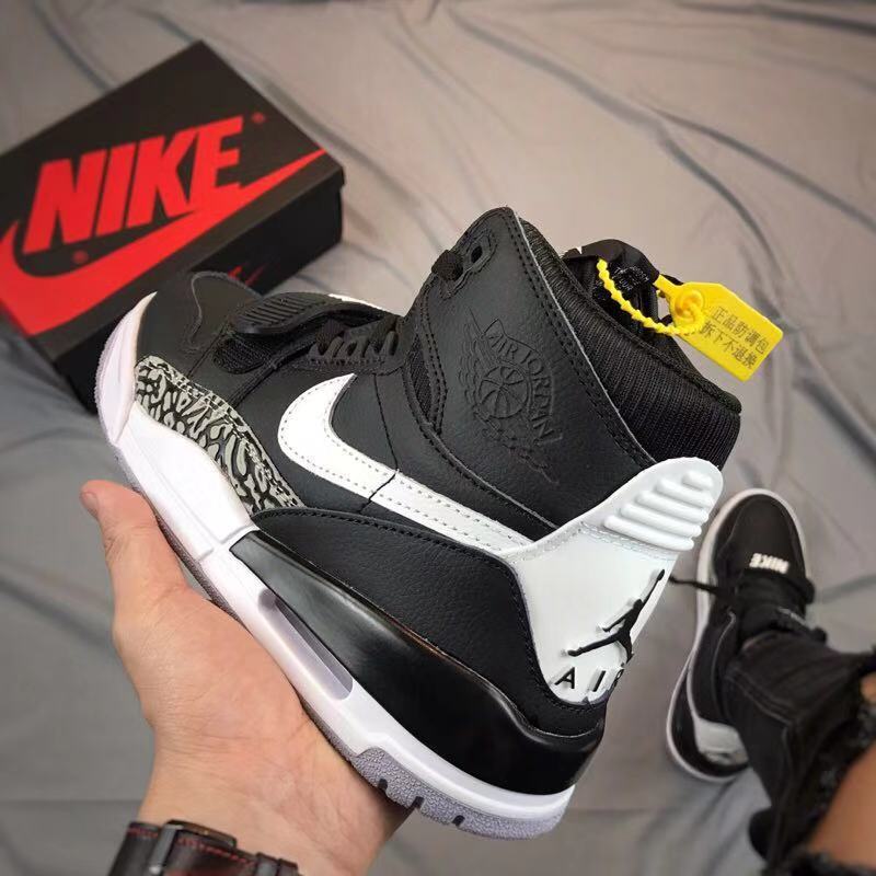 Air Jordan Legacy 312 High-Top Sneakers in Black and White - product image from the listing.