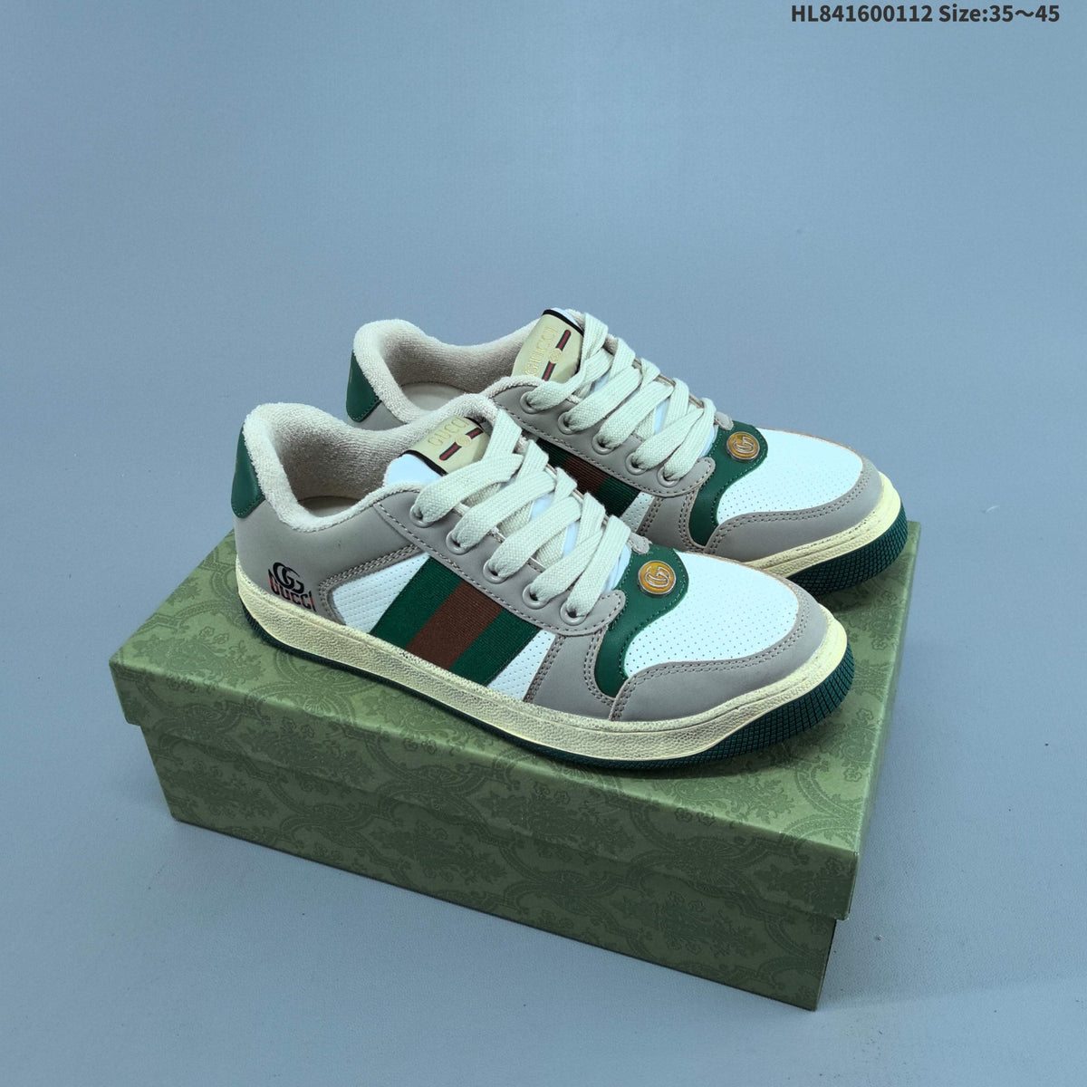 Gucci Screener Distressed Low-Cut Sneakers - product image from the listing.