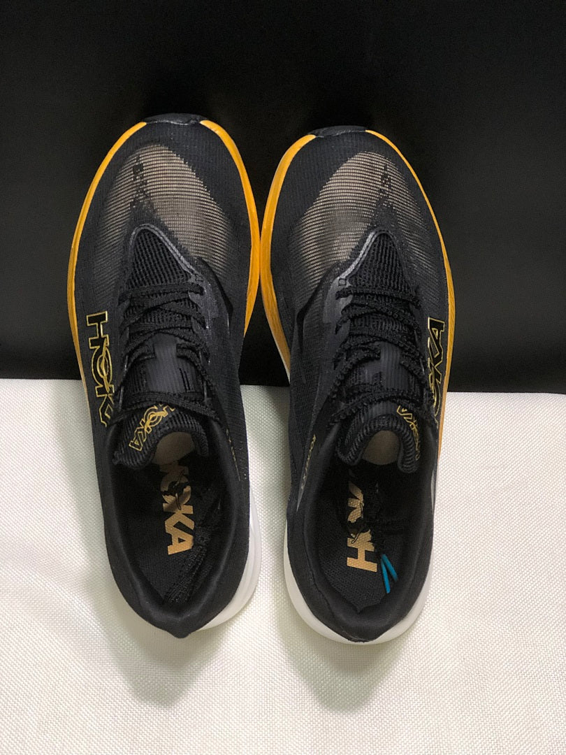 Black and Gold HOKA Rocket X 3 Running Shoes - product image from the listing.
