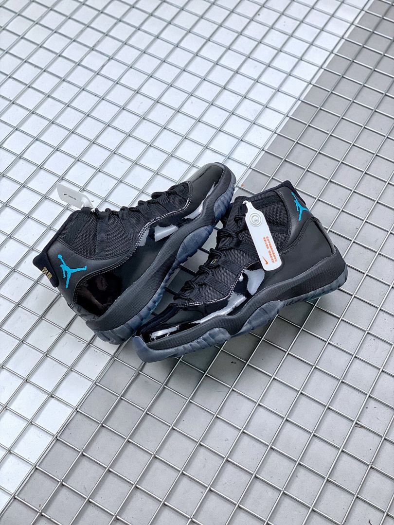 Air Jordan 11 Retro Gamma Black Sneakers 378037-006 - product image from the listing.