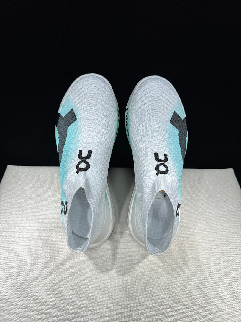 On Cloudboom Strike LS Running Shoes in White Light Green - product image from the listing.