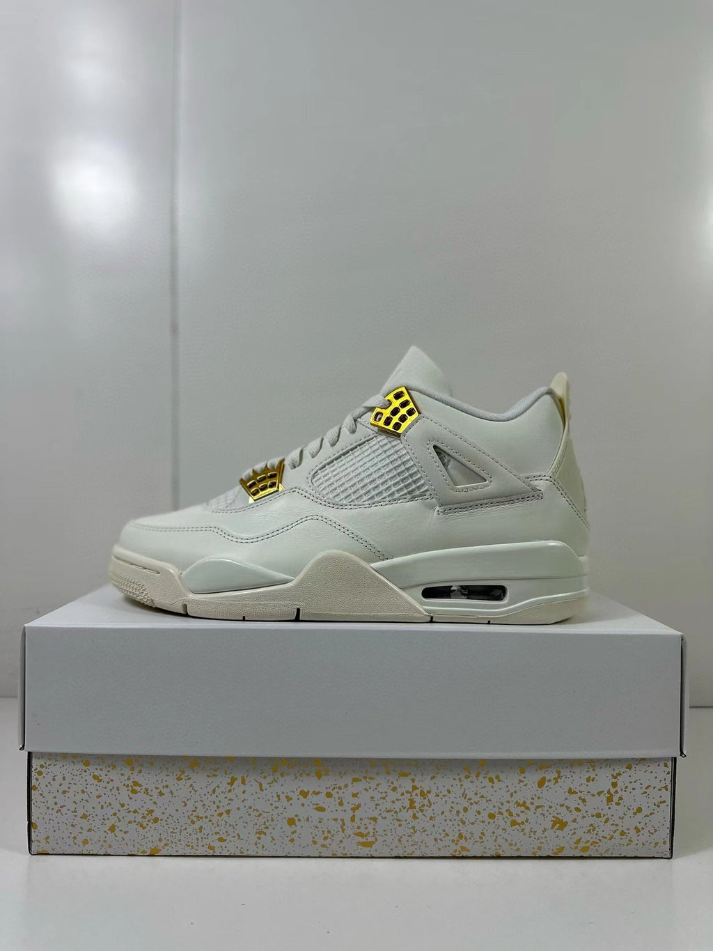 Air Jordan 4 Metallic Gold Sneakers White AQ9129-170 - product image from the listing.