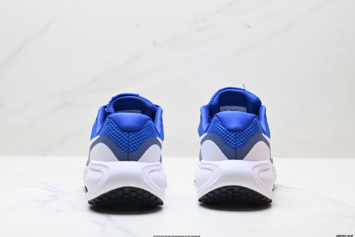Blue and White Nike Revolution 8 Running Shoes - product image from the listing.