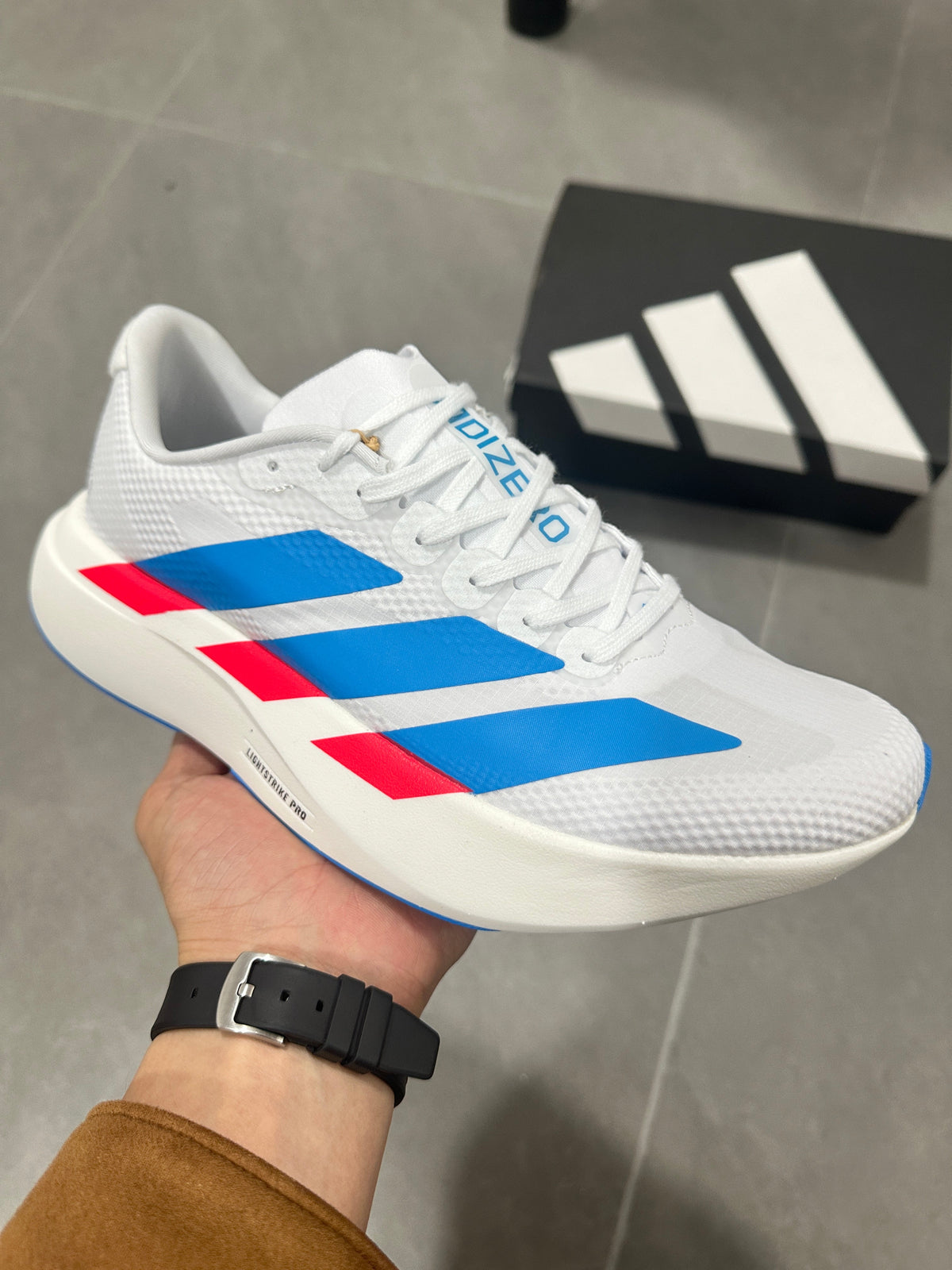 Adidas Lightstrike Pro Running Shoes in White Blue Red KJ3596 - product image from the listing.