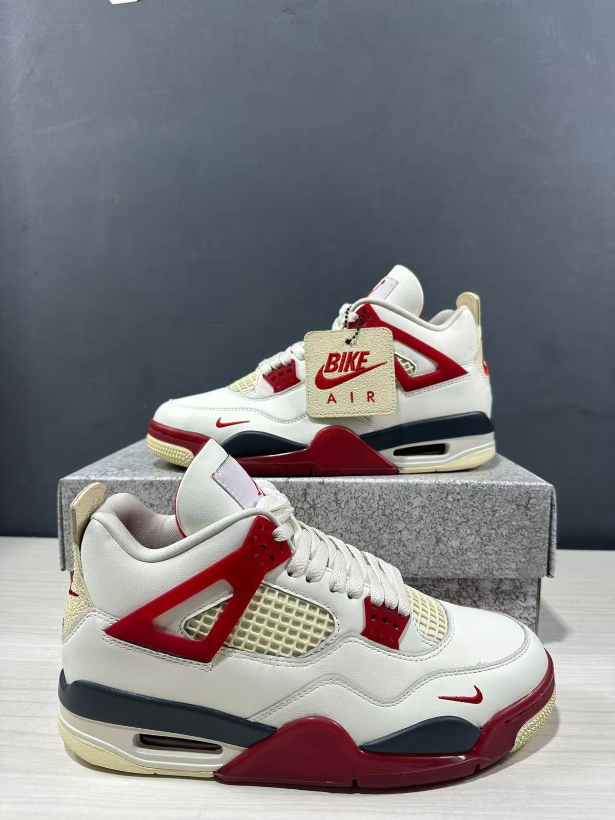 Air Jordan 4 Retro White Red Sneakers - product image from the listing.